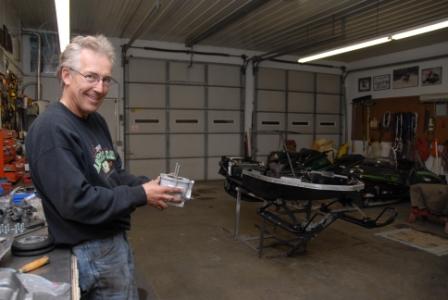 Brian smiling at the ugly grind job I did on the cylinder for Joey's sled