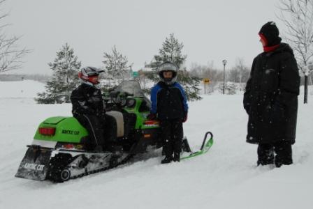 One running Arctic Cat brings the neighbor kids over in a hurry