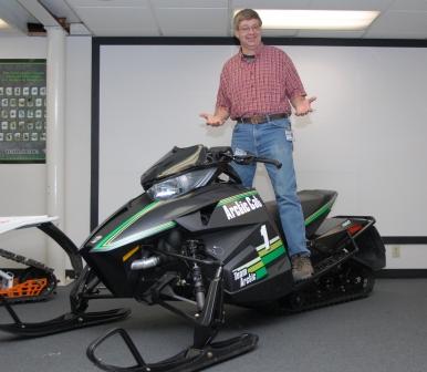 Nelson poses with a mocked-up 2012 Arctic Cat 50th Anniversary model, wearing his favorite shirt