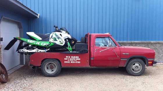 Towing an Arctic Cat Sno Pro race sled the old-fashioned way