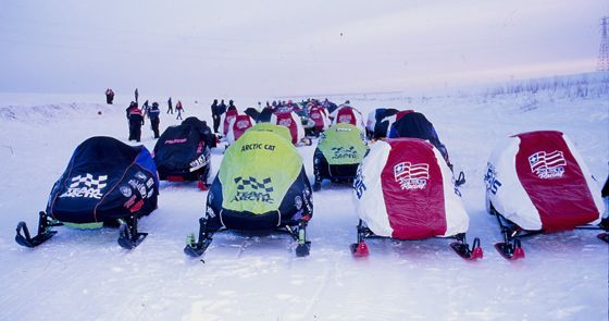 Race sleds lined up in Winnipeg at the 1996 I-500, by ArcticInsider.com