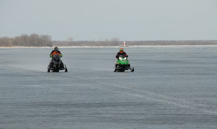Arctic Cat's Larry Coltom and Ryan Hayes testing prototype sleds in 2010. Photo by ArcticInsider.com