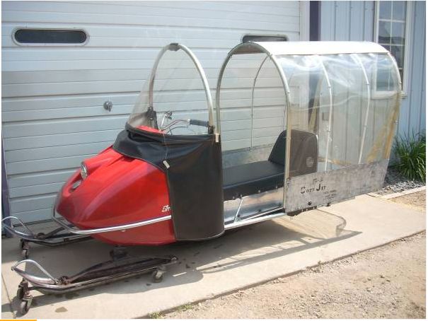 Vintage snowmobile with bubble kit.