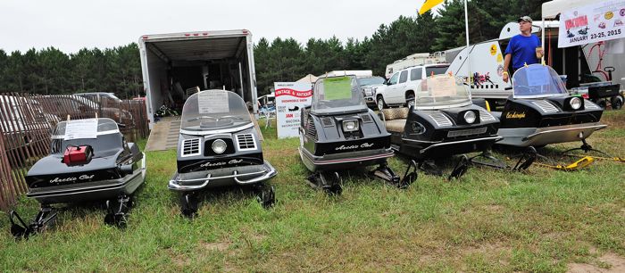 Litter of vintage Arctic Cats on display at Outlaws. Photo by ArcticInsider.com