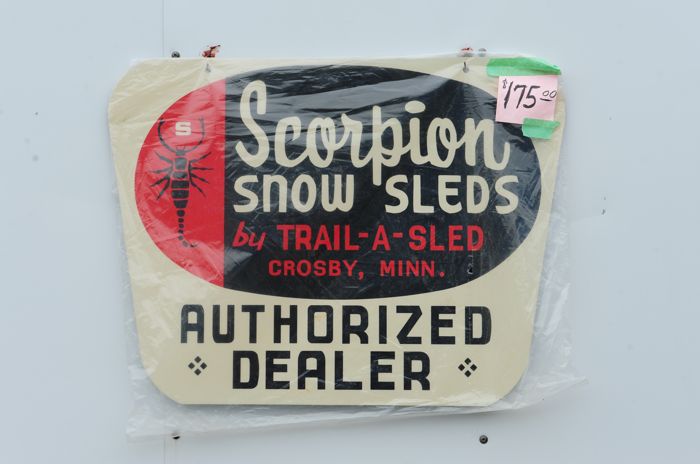 Scorpion snowmobile dealership sign. Photo by ArcticInsider.com