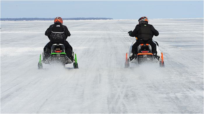 Jim Dimmerman (L) and Larry Coltom race Arctic Cat 9000 turbos. Photo by ArcticInsider.com