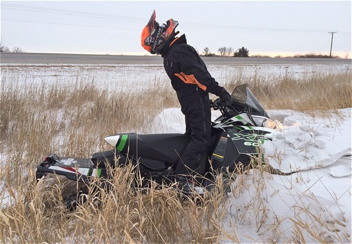 Sandberg is a professional snowmobile rider. Or not. 