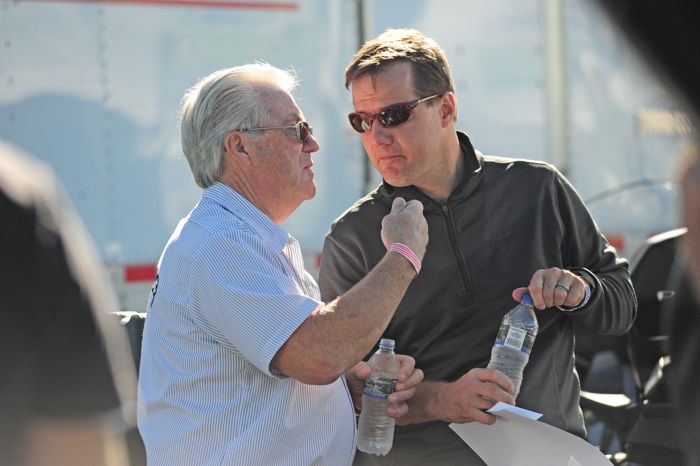 Arctic Cat's Roger Skime (L) talks with John Collins of Textron Off Road. Photo by ArcticInsider.