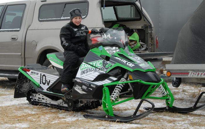 Calvin Sandberg, happy to have finished his first ever snowmobile race in 2011.