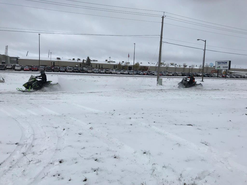 Arctic Cat engineers snowmobiling in TRF on Oct. 11, 2018.
