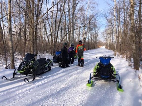 When the trails are this nice, it never hurts to stop and share your excitement on how much you love snowmobiling and discuss the obvious regarding how nice the trails are.