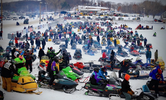 650+ snowmobiles lined up to participate in the Jack Speckel memorial ride. The line-up of sleds encompassed nearly all 5 miles of the one-way trail loop. Impressive to witness!