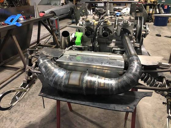 Jim Zimmerman is building a SnoPro with 1100 triple prototype engine that never saw production in 2003