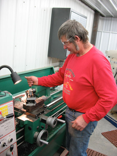 Kirk Hibbert working the lathe